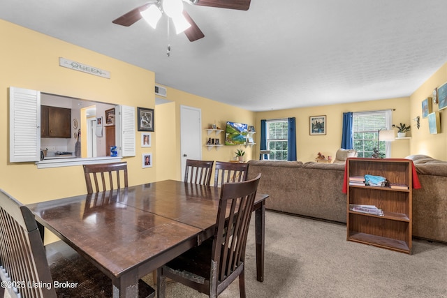 1007 Lake Pl Unit H11, Louisville, KY 40222 - dining room featuring carpet flooring and ceiling fan