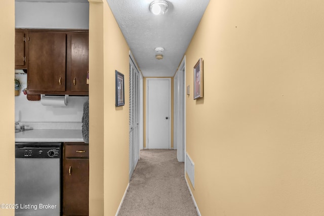 1007 Lake Pl Unit H11, Louisville, KY 40222 - hallway featuring light colored carpet and baseboards