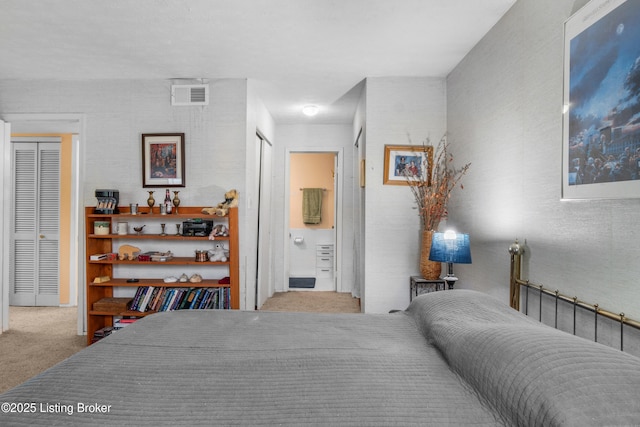 1007 Lake Pl Unit H11, Louisville, KY 40222 - carpeted bedroom featuring ensuite bath