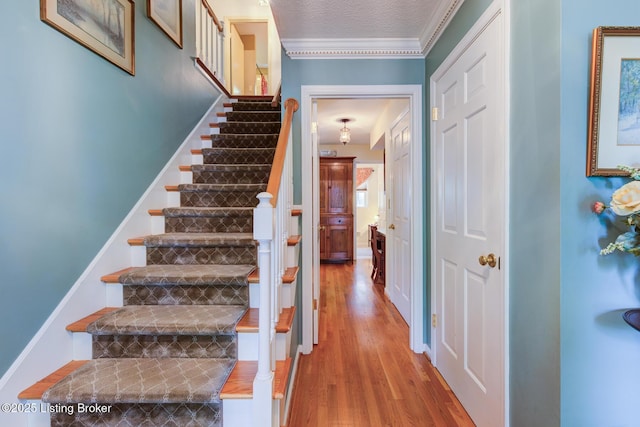 7009 Quail Brace Ct, Louisville, KY 40241 - stairway featuring wood finished floors and crown molding