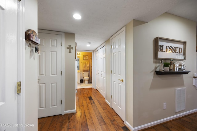 12582 Springfalls Ct, Louisville, KY 40229 - hall with wood-type flooring and recessed lighting