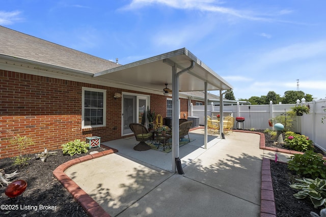 12582 Springfalls Ct, Louisville, KY 40229 - fenced backyard with ceiling fan and a patio