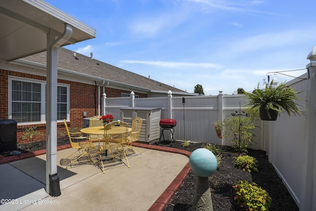 12582 Springfalls Ct, Louisville, KY 40229 - view of patio featuring a grill