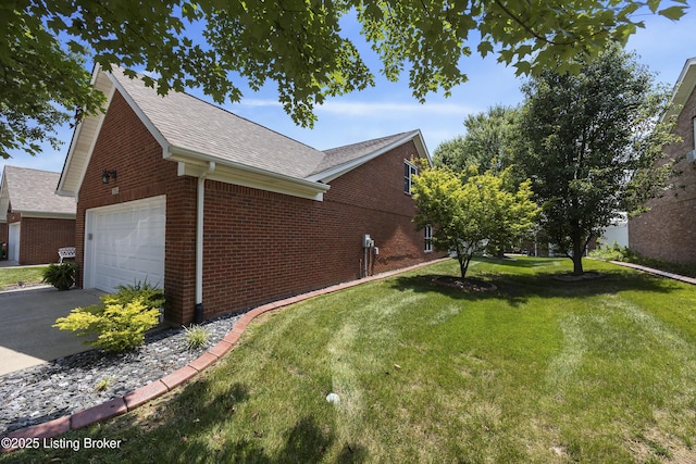12582 Springfalls Ct, Louisville, KY 40229 - view of side of property with brick siding, a shingled roof, a yard, a garage, and driveway
