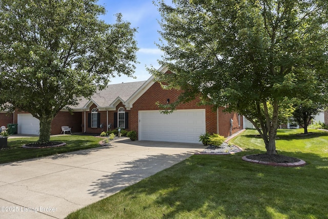 12582 Springfalls Ct, Louisville, KY 40229 - view of front of house with a garage, driveway, a front lawn, and brick siding