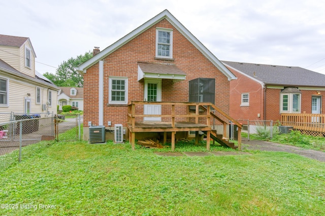 3019 Wirth Ave, Louisville, KY 40217 - back of house featuring a gate, a wooden deck, brick siding, and a chimney