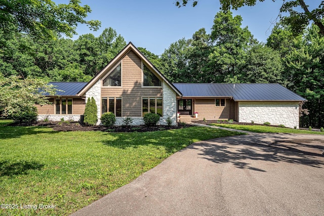 2918 Spickert Knob Rd, Floyds Knobs, IN 47119 - view of front of house featuring stone siding, a metal roof, a front lawn, and a standing seam roof
