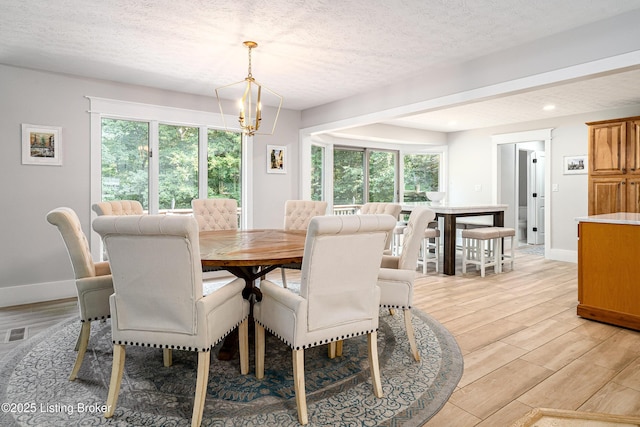 2918 Spickert Knob Rd, Floyds Knobs, IN 47119 - dining area featuring a chandelier, a textured ceiling, healthy amount of natural light, light wood finished floors, and recessed lighting