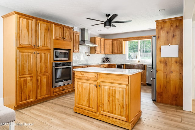 2918 Spickert Knob Rd, Floyds Knobs, IN 47119 - kitchen with stainless steel appliances, wall chimney exhaust hood, light countertops, decorative backsplash, and a ceiling fan