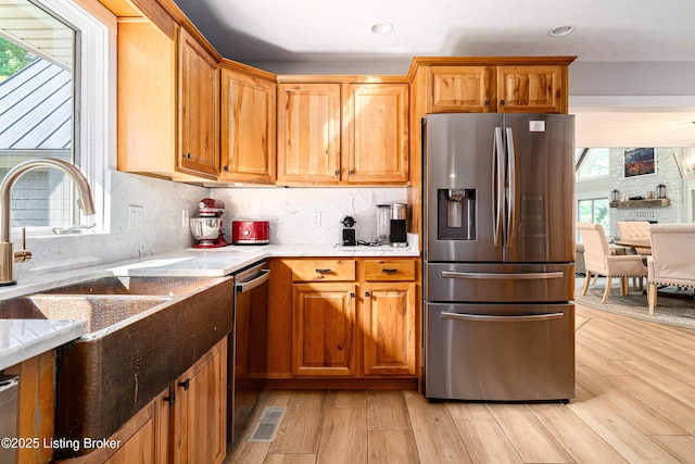 2918 Spickert Knob Rd, Floyds Knobs, IN 47119 - kitchen with appliances with stainless steel finishes, plenty of natural light, light wood-style floors, and recessed lighting