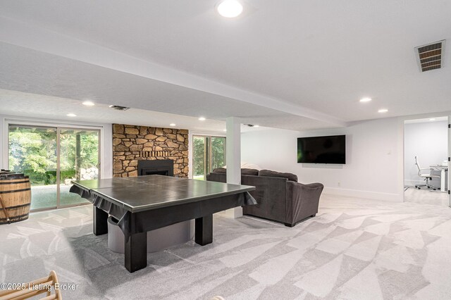 2918 Spickert Knob Rd, Floyds Knobs, IN 47119 - rec room with light colored carpet, recessed lighting, a fireplace, and plenty of natural light