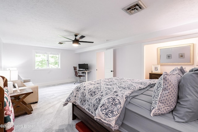2918 Spickert Knob Rd, Floyds Knobs, IN 47119 - bedroom with light carpet, a desk, a textured ceiling, and a ceiling fan