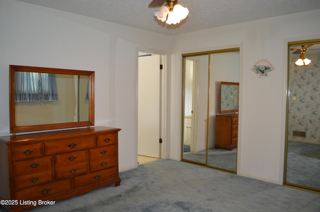8413 Old Boundary Rd, Louisville, KY 40291 - bedroom with carpet floors, a closet, and a ceiling fan