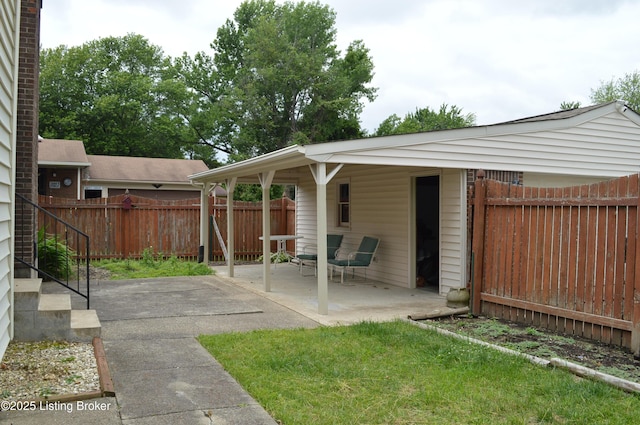 8413 Old Boundary Rd, Louisville, KY 40291 - fenced backyard with a patio area
