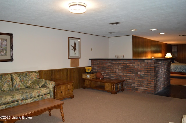 8413 Old Boundary Rd, Louisville, KY 40291 - carpeted living area featuring wood walls, a wainscoted wall, recessed lighting, and ornamental molding