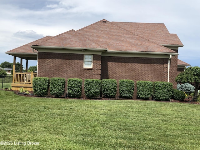 149 Wood Gate Dr, Mt Washington, KY 40047 - view of home's exterior with a yard, brick siding, and a shingled roof