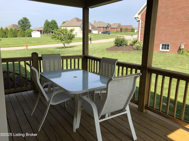 149 Wood Gate Dr, Mt Washington, KY 40047 - deck featuring outdoor dining area, a residential view, and a lawn