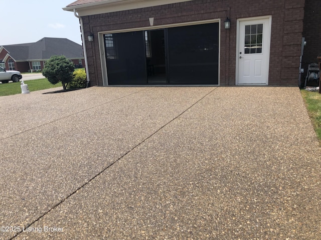 149 Wood Gate Dr, Mt Washington, KY 40047 - garage featuring concrete driveway