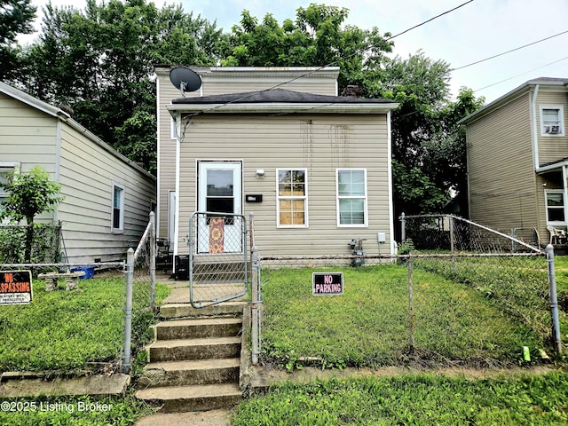 2426 Rowan St, Louisville, KY 40212 - shotgun-style home featuring a gate