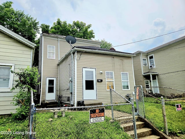 2426 Rowan St, Louisville, KY 40212 - back of property featuring entry steps and a gate