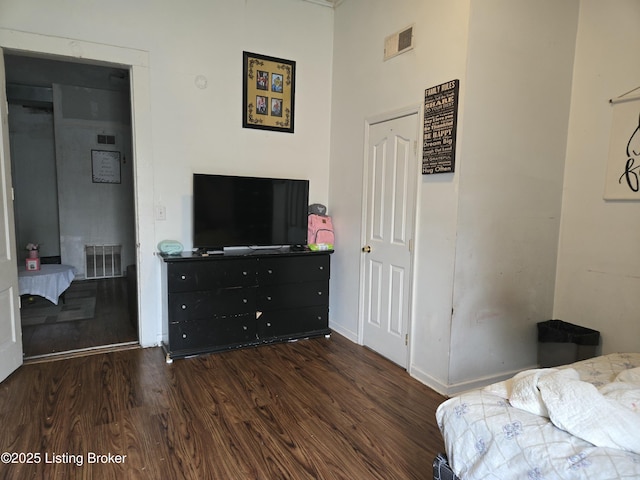 2426 Rowan St, Louisville, KY 40212 - bedroom featuring dark wood finished floors and baseboards