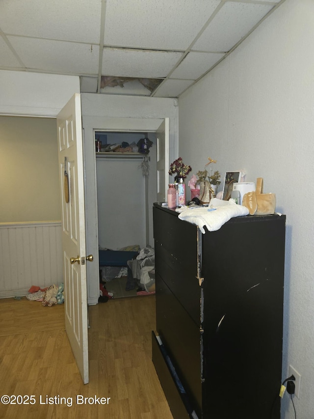 2426 Rowan St, Louisville, KY 40212 - interior space featuring light wood-style flooring and a drop ceiling