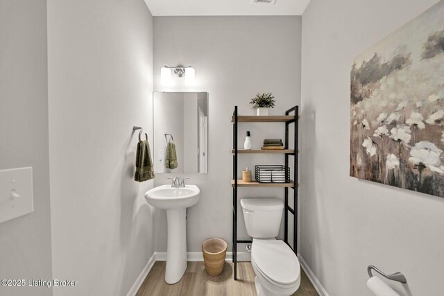 19136 Catalpa Fields Pl, Louisville, KY 40023 - bathroom with toilet and wood finished floors