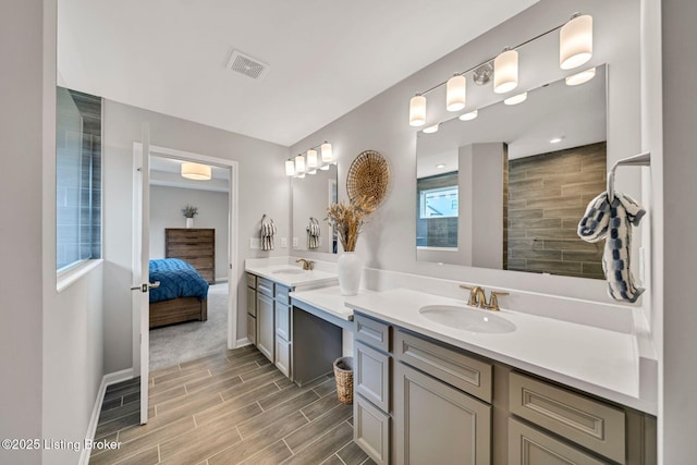 19136 Catalpa Fields Pl, Louisville, KY 40023 - bathroom featuring double vanity, wood finished floors, and ensuite bath