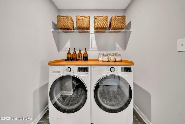 19136 Catalpa Fields Pl, Louisville, KY 40023 - laundry area featuring separate washer and dryer, a bar, and wood finished floors