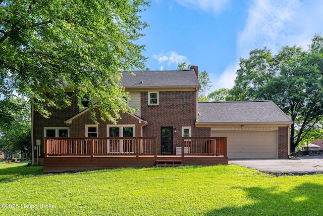 3627 E Locust Cir, Prospect, KY 40059 - back of house with driveway, an attached garage, a lawn, and brick siding