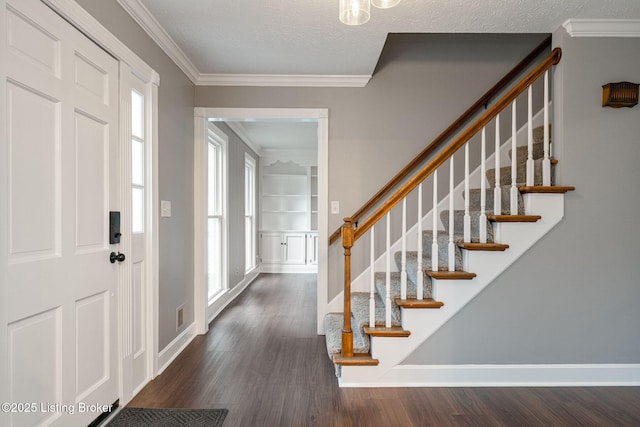 3627 E Locust Cir, Prospect, KY 40059 - entrance foyer with dark wood-style floors, stairway, ornamental molding, and a textured ceiling