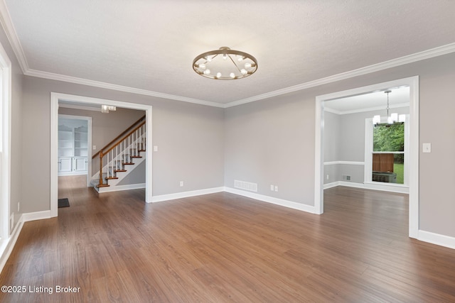 3627 E Locust Cir, Prospect, KY 40059 - spare room featuring a chandelier, stairs, dark wood finished floors, ornamental molding, and a textured ceiling