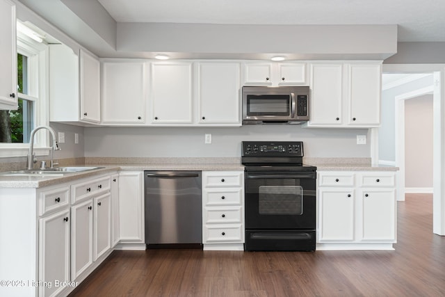3627 E Locust Cir, Prospect, KY 40059 - kitchen with stainless steel appliances, white cabinets, and dark wood finished floors