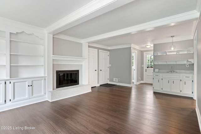 3627 E Locust Cir, Prospect, KY 40059 - unfurnished living room with crown molding, dark wood-style floors, and a brick fireplace