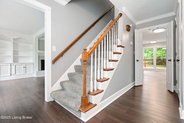 3627 E Locust Cir, Prospect, KY 40059 - stairs featuring wood finished floors, crown molding, a fireplace, and built in features