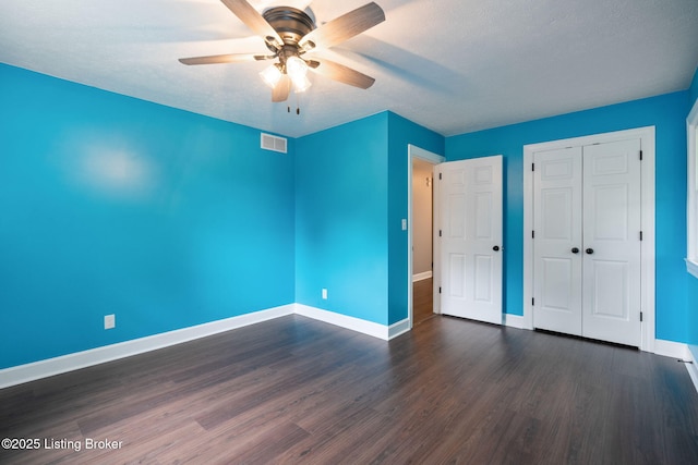 3627 E Locust Cir, Prospect, KY 40059 - unfurnished bedroom featuring dark wood-style flooring, a closet, and ceiling fan