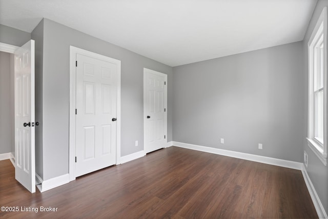 3627 E Locust Cir, Prospect, KY 40059 - unfurnished bedroom featuring dark wood-style flooring and baseboards