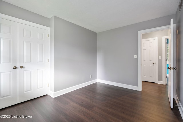 3627 E Locust Cir, Prospect, KY 40059 - unfurnished bedroom with dark wood-style flooring and a closet