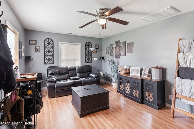 703 Cheri Way, Fairdale, KY 40118 - living room featuring ceiling fan and light wood-style floors