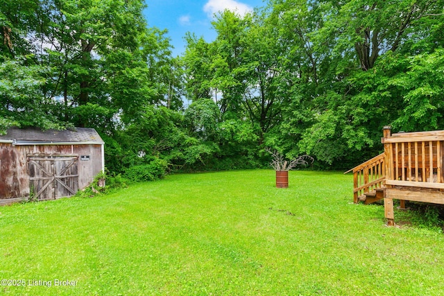 703 Cheri Way, Fairdale, KY 40118 - view of grassy yard with an outbuilding, a barn, and view of scattered trees