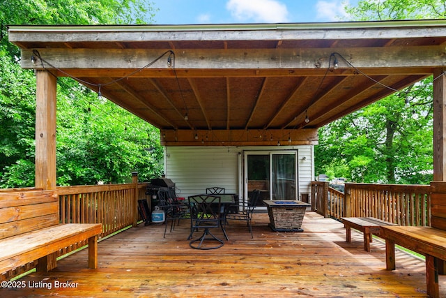 703 Cheri Way, Fairdale, KY 40118 - wooden terrace featuring outdoor dining space, a fire pit, and area for grilling
