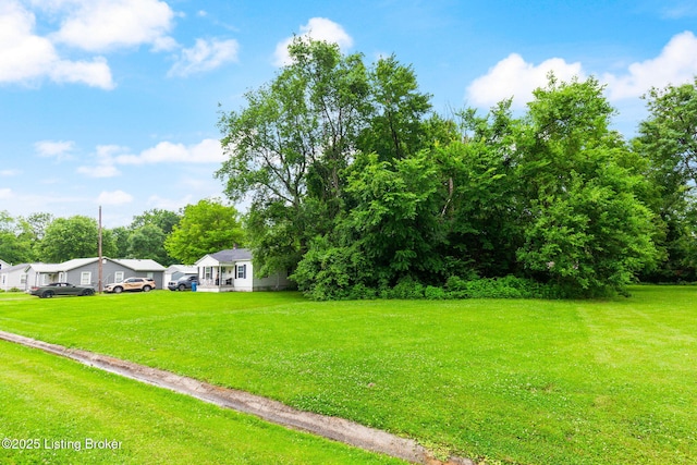 703 Cheri Way, Fairdale, KY 40118 - view of green lawn with view of scattered trees