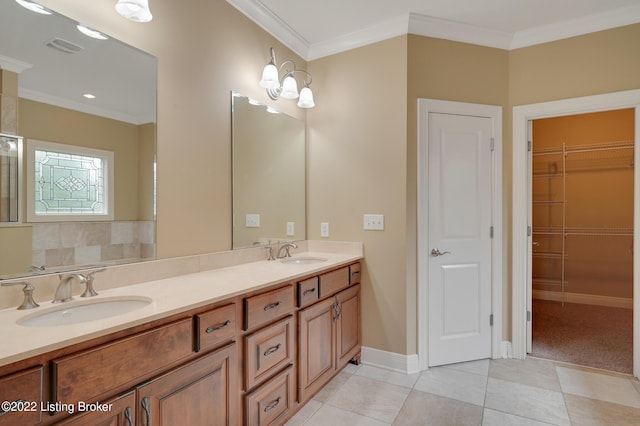 3509 Sasse Way, Louisville, KY 40245 - bathroom featuring double vanity, tile patterned flooring, crown molding, and a spacious closet