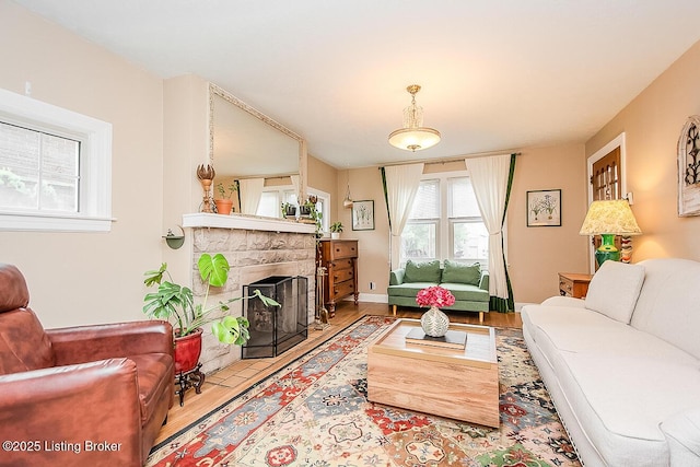 114 S Crestmoor Ave, Louisville, KY 40206 - living room featuring a fireplace and wood finished floors