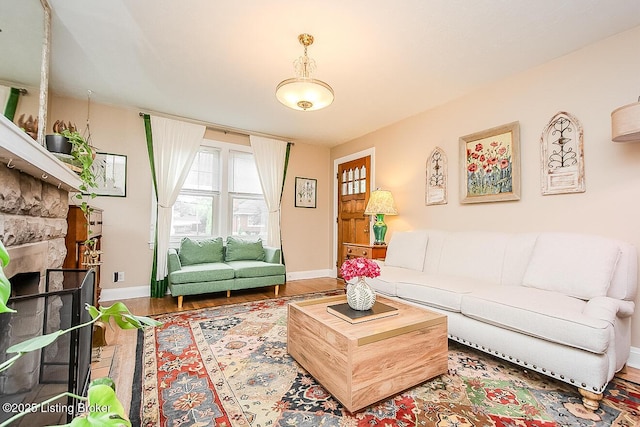 114 S Crestmoor Ave, Louisville, KY 40206 - living room featuring wood finished floors and a fireplace