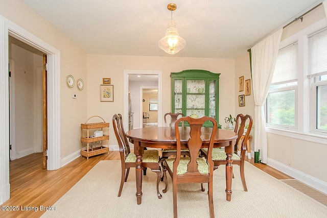114 S Crestmoor Ave, Louisville, KY 40206 - dining room featuring light wood-style floors and baseboards