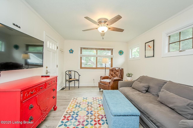 114 S Crestmoor Ave, Louisville, KY 40206 - living area with light wood-style floors, ceiling fan, and ornamental molding