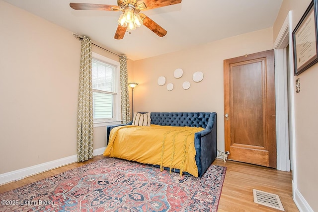 114 S Crestmoor Ave, Louisville, KY 40206 - bedroom featuring light wood finished floors and ceiling fan