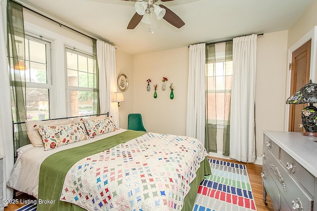 114 S Crestmoor Ave, Louisville, KY 40206 - bedroom with light wood finished floors and ceiling fan