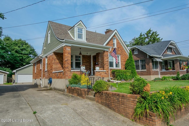 114 S Crestmoor Ave, Louisville, KY 40206 - view of front of property with a porch, an outdoor structure, brick siding, a detached garage, and a chimney